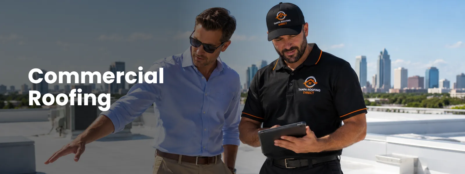 Tampa Roofing Direct professional consulting with a commercial property manager on a flat roof